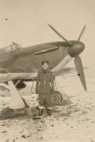 Peter Provenzano Photo Album Image_copy_058.jpg - Jim McGinni in front of a Hawker Hurricane I.  RAF Station Kirton Lindsey, February 1941.